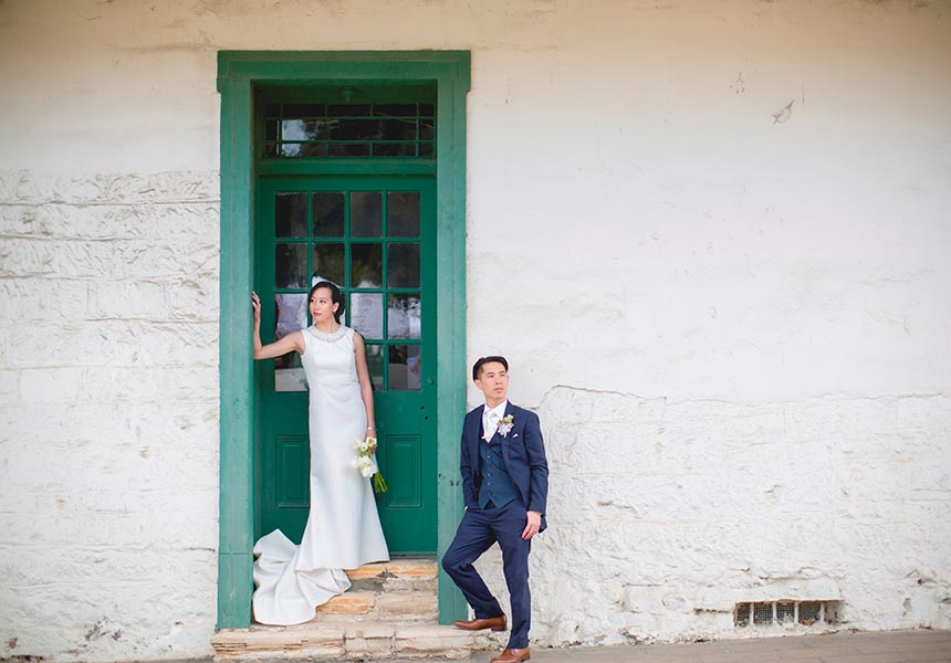 Couple taking wedding photos.