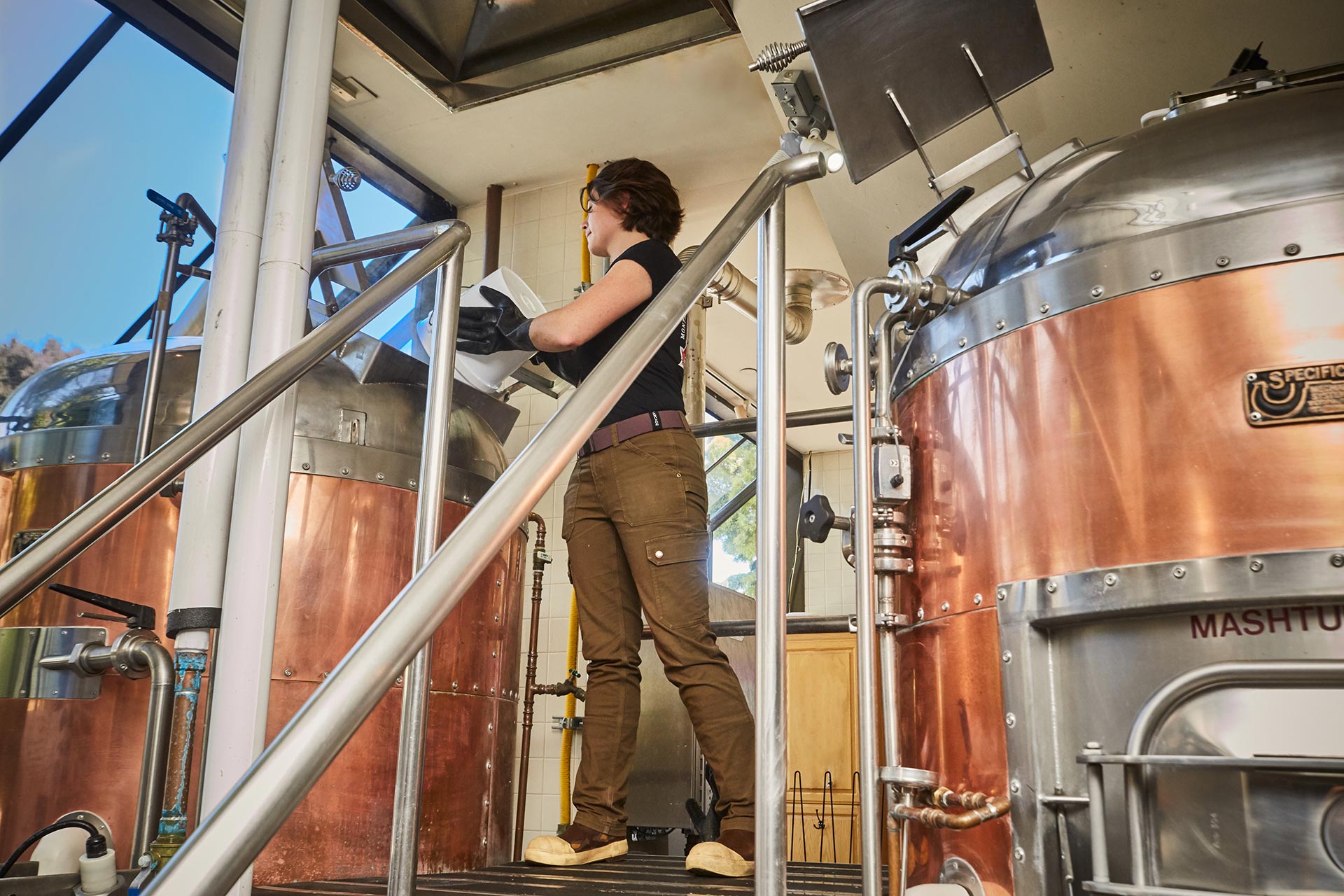 Brewer filling grain.
