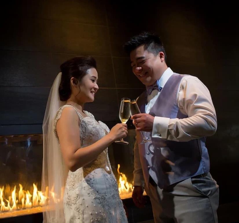 cheers from bride and groom