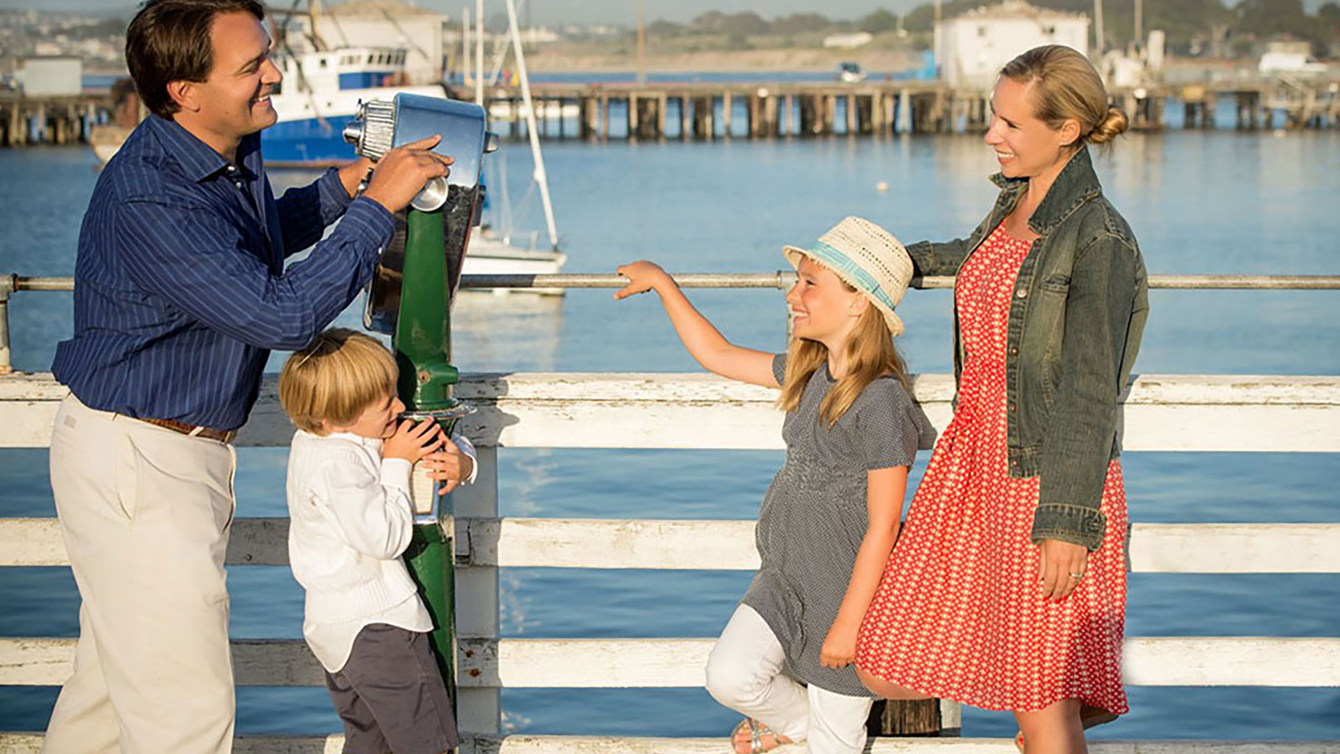 family at the pier